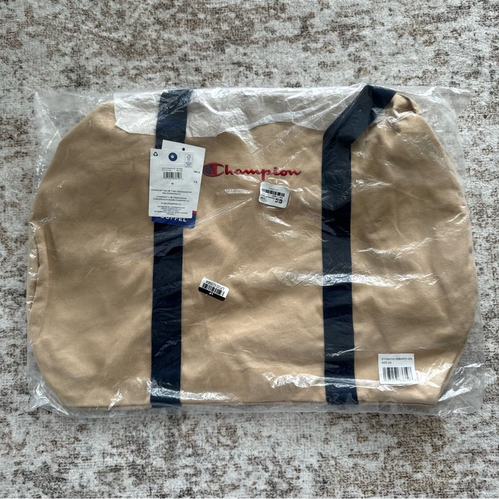 New with tags Champion duffel bag tan